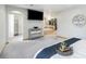 Spacious main bedroom featuring a large walk-in closet and access to ensuite bathroom at 7285 S Yukon Ct, Littleton, CO 80128