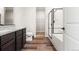 Beautiful bathroom with granite countertop vanity, tub with shower, and toilet at 8836 Waco Ct, Commerce City, CO 80022