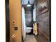 Bathroom featuring a clawfoot tub, wood plank walls, and stylish fixtures at 83 Wilderness Cornerstone Rd, Evergreen, CO 80439