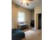 Bedroom featuring a keyboard, window view, and ample space at 83 Wilderness Cornerstone Rd, Evergreen, CO 80439