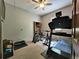 Spacious bedroom area featuring exercise equipment at 83 Wilderness Cornerstone Rd, Evergreen, CO 80439
