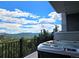 Outdoor hot tub with scenic mountain view, offering a relaxing retreat at 83 Wilderness Cornerstone Rd, Evergreen, CO 80439