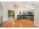 Open kitchen area with stainless steel appliances at 7120 S Clay St, Littleton, CO 80120