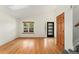 Bright living room with hardwood floors and a skylight at 7120 S Clay St, Littleton, CO 80120