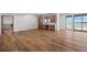 Spacious basement recreation area with wet bar and access to patio at 5320 Dual Rey Pt, Sedalia, CO 80135
