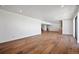 Spacious finished basement with hardwood floors and large windows at 5320 Dual Rey Pt, Sedalia, CO 80135