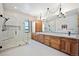 Modern bathroom with double vanity and large shower at 5320 Dual Rey Pt, Sedalia, CO 80135