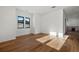 Spacious bedroom with hardwood floors and large windows with mountain views at 5320 Dual Rey Pt, Sedalia, CO 80135