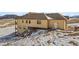 Two-story house exterior with a large backyard at 5320 Dual Rey Pt, Sedalia, CO 80135