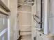 Functional utility room with exposed piping, offering easy access for maintenance and repairs at 7498 S Alkire St # 202, Littleton, CO 80127