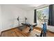 Bedroom featuring hardwood floors, a weight rack, and a large window with a view at 8386 S Davco Dr, Morrison, CO 80465