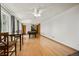 Open game room with a pool table, dining area, and hardwood floors at 8386 S Davco Dr, Morrison, CO 80465