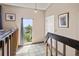 Hallway has a window with mountain views and nature-themed artwork at 8386 S Davco Dr, Morrison, CO 80465