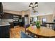 Eat-in kitchen features stainless appliances and hardwood floors at 8386 S Davco Dr, Morrison, CO 80465