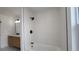 Newly renovated bathroom with textured tiles and modern fixtures at 10297 W Crestone Mtn, Littleton, CO 80127