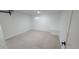 A minimalist bedroom with clean lines and neutral carpeting at 10297 W Crestone Mtn, Littleton, CO 80127