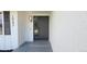 Close-up of the front door, showcasing the modern design and sleek hardware at 10297 W Crestone Mtn, Littleton, CO 80127
