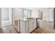 Modern kitchen features a kitchen island, stainless steel appliances, and contemporary finishes at 485 Interlocken Blvd # 209, Broomfield, CO 80021