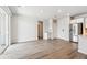 Spacious living room boasts natural light, and a refrigerator at 485 Interlocken Blvd # 209, Broomfield, CO 80021