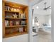 Cozy bedroom featuring stylish built-ins and an organized workspace at 2649 N Cook St, Denver, CO 80205