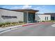 Exterior view of City Park Golf Course building featuring a stylish entrance with landscaping at 2649 N Cook St, Denver, CO 80205