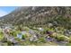 Beautiful aerial view of homes nestled in a wooded mountain landscape at 1777 Main St, Georgetown, CO 80444