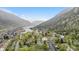 Breathtaking aerial view of a lakeside town nestled in the mountains at 1777 Main St, Georgetown, CO 80444