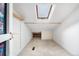 Finished attic space featuring a skylight and neutral carpeting at 1777 Main St, Georgetown, CO 80444