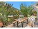A cozy deck with wooden furniture and a picturesque mountain view at 1777 Main St, Georgetown, CO 80444