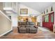Open-concept living space connecting the kitchen and a comfortable sofa for relaxing and entertaining at 1777 Main St, Georgetown, CO 80444