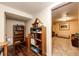 A view from the storage area, into the finished basement featuring carpet and neutral paint at 12632 W Virginia Ave, Lakewood, CO 80228