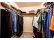 Well-organized walk-in closet providing ample storage space for clothes and accessories at 12632 W Virginia Ave, Lakewood, CO 80228