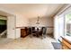 Dining area with pendant lighting and sliding door to outdoor patio at 12632 W Virginia Ave, Lakewood, CO 80228