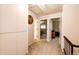 Second-floor hallway with doorways into various rooms and carpeted floor at 12632 W Virginia Ave, Lakewood, CO 80228