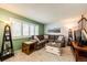 Comfortable living room with a sectional sofa, neutral tones, and modern decor at 12632 W Virginia Ave, Lakewood, CO 80228