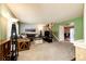 Cozy living room with plush seating, neutral carpet, fireplace, and staircase to the upper level at 12632 W Virginia Ave, Lakewood, CO 80228