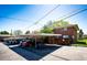 Assigned covered parking spaces behind the brick building at 12632 W Virginia Ave, Lakewood, CO 80228