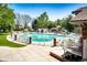 Community swimming pool with lounge chairs, providing a relaxing and enjoyable recreational space for residents at 12632 W Virginia Ave, Lakewood, CO 80228