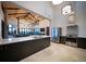 Spacious open-concept kitchen with stainless steel appliances and large island at 7243 Prairie Sage Ln, Littleton, CO 80125