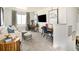 Loft space with desk, television, and comfortable seating, great for relaxation and productivity at 7243 Prairie Sage Ln, Littleton, CO 80125