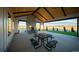 Spacious outdoor patio features picnic-style seating and views of the surrounding landscape at 7243 Prairie Sage Ln, Littleton, CO 80125