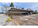 Covered parking area with multiple spaces, providing convenient and sheltered parking for residents at 13993 E Jewell Ave, Aurora, CO 80012