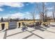 A beautifully designed backyard patio featuring a fire pit, chairs, and concrete design, perfect for outdoor gatherings at 538 Fairfield Ln, Louisville, CO 80027