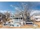 An expansive backyard with a deck, patio with firepit, grill, and hot tub offers unparalleled outdoor living at 538 Fairfield Ln, Louisville, CO 80027