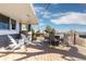 Outdoor deck with lounge chairs, dining furniture, and a relaxing atmosphere at 538 Fairfield Ln, Louisville, CO 80027