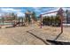 Community playground featuring swings and slides at 538 Fairfield Ln, Louisville, CO 80027