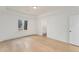 Bright bedroom with natural light, hardwood flooring, and an en-suite bathroom at 2111 E Alameda Ave, Denver, CO 80209