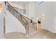 Grand foyer with a staircase and tall ceilings at 2111 E Alameda Ave, Denver, CO 80209