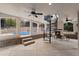 Outdoor space with fireplace, spiral staircase, pool view, and ample seating at 2111 E Alameda Ave, Denver, CO 80209