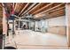 Unfinished basement offering ample space and potential for customization with exposed ceiling at 350 N Langdale Ct, Aurora, CO 80018